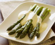 Asparagus served with hollandaise made with creme fraiche