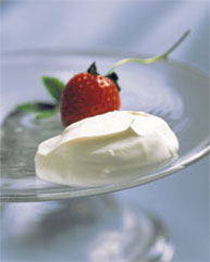 Fresh strawberry with dollop of creme fraiche